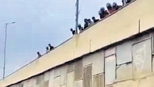 Irked motorists fling scooters from the Nelamangala flyover