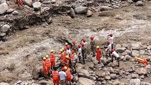 An NDRF team conducts a rescue operation after a cloudburst in the Samej Khad of Rampur area in Shimla on Aug 1, 2024.