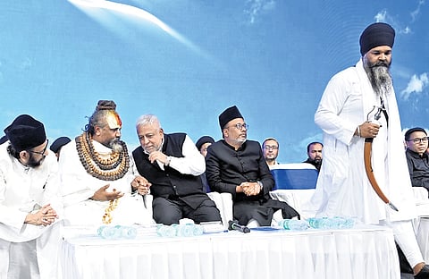 Religious leaders participate in an event to mark the 32nd Hussain Day at Shia Aramgh Eidgah in Richmond Town on Sunday