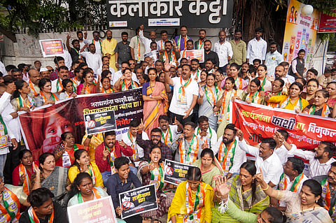 NCP (SP) leader Supriya Sule and others during a protest over the Badlapur sexual abuse case, in Pune, Wednesday, Aug. 21, 2024.
