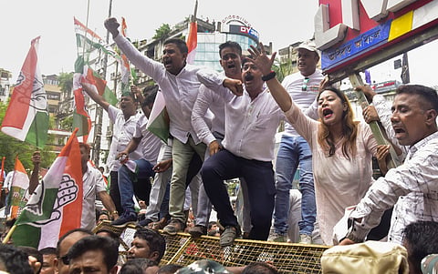 Congress workers prtoest in front of the ED office against the alleged Adani mega scam, in Guwahati, Thursday, Aug. 22, 2024.