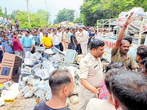 Framers and residents dumping electricity meters outside TPWODL office as they protest over inflated bills.
