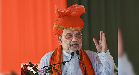 Union Home Minister Amit Shah addresses during a party worker meet ahead of Jammu and Kashmir Assembly elections, in Jammu.