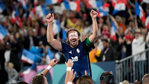 France's captain Frederic Villeroux celebrate after scoring the decisive penalty and winning the blind football gold medal match at the 2024 Paralympics.