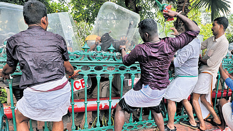 Yuva Morcha activists clash with police personnel in front of the secretariat during their protest demanding the resignation of Chief Minister Pinarayi Vijayan over the revelations of LDF MLA PV Anvar