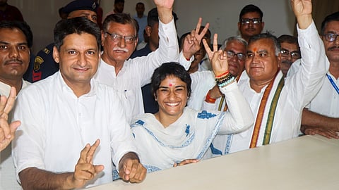 Congress leader Deepender Hooda, former wrestler and Congress candidate from Julana constituency Vinesh Phogat and others during her nomination filing for the upcoming Haryana Assembly elections.