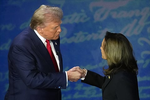 The Democratic vice president opened the faceoff with a power move, marching across the stage to Trump’s lectern to shake his hand...