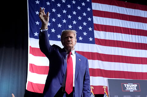 Republican presidential nominee former President Donald Trump departs after speaking at a campaign event at the Linda Ronstadt Music Hall.