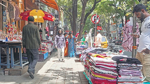 Across the city, shops and vendors have turned footpaths into commercial zones, elbowing out pedestrians