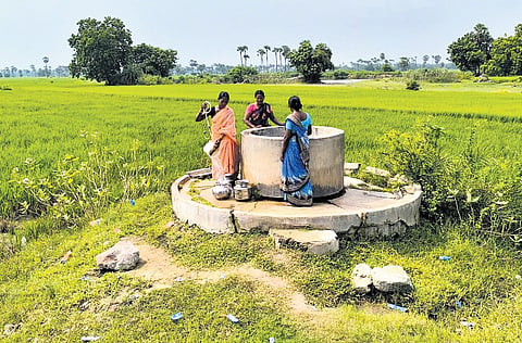 Women seen drawing water from a well at Nagavaram village