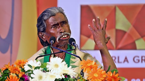 Folk poet Haladhar Nag recites one of his poems at OLF