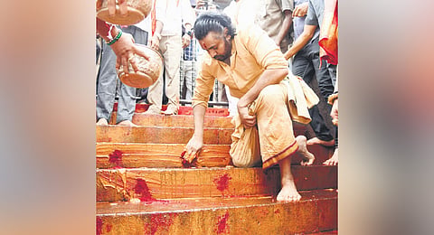 As part of the purification ritual, Deputy Chief Minister Pawan Kalyan cleansed the steps of Durga temple in Vijayawada on Tuesday