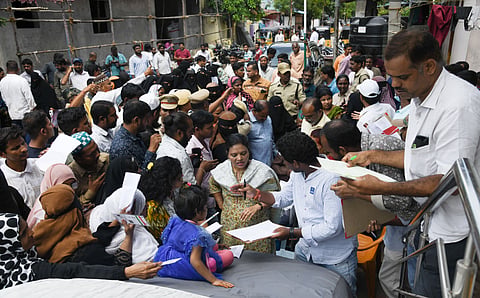 Officials verify Aadhaar details of people affected by Musi Riverfront Development Project for allotment of 2BHK flats, in Hyderabad on Saturday