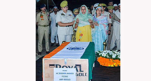 Family members during the wreath laying ceremony of J&K head constable Bashir Ahmed who was killed in in Kathua encounter, in Jammu, Sunday, Sept. 29, 2024.