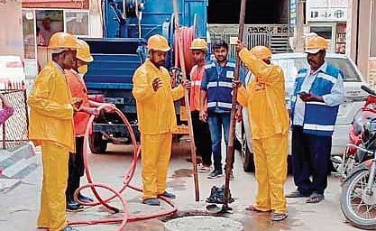 Special teams with air tech machines start desilting of a sewage with air tech vehicles in Omer Colony in Baba Nagar