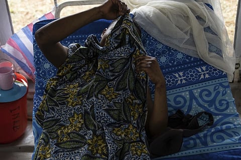 A sex worker suffering from mpox, lies down Wednesday, Sept. 4, 2024 in the general hospital in Kamituga, eastern Congo
