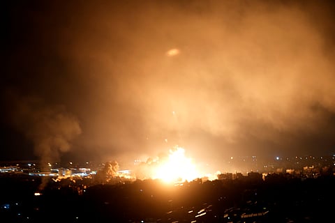 Flames rise from Israeli airstrikes in Dahiyeh, Beirut, Lebanon, Friday, Oct. 4, 2024.