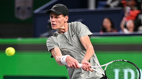 Italy's Jannik Sinner hits a return to Argentina's Tomas Martin Etcheverry during their men's singles match at the Shanghai Masters.