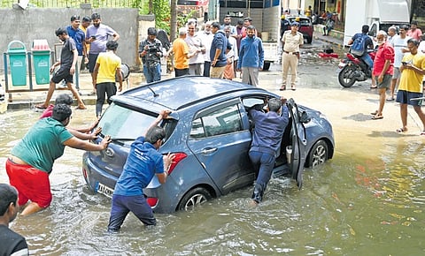 The Kendriya Vihar apartment in Yelahanka was flooded with knee-deep water following heavy rain on Saturday night and Sunday morning