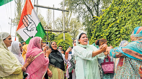 Supporters of Congress and NC celebrate during the counting of votes of Jammu and Kashmir Assembly elections on Tuesday