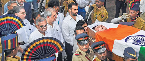 Tata Sons Chairman N Chandrasekaran, Neville Tata and others during last rites of industrialist Ratan Tata, at Worli Crematorium in Mumbai on Thursday.
