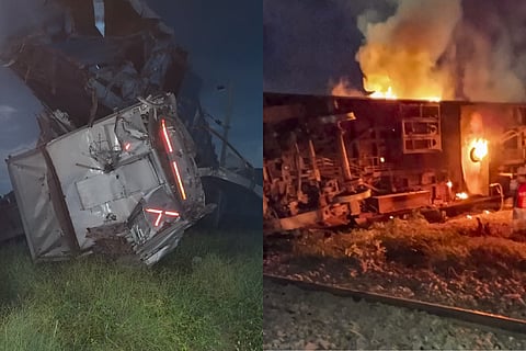 Coaches derailed after an express train rammed into a stationary train, at Kavarapettai in Tiruvallur district, Friday.