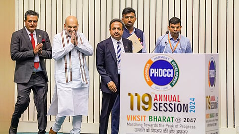 Union Home Minister Amit Shah arrives to address the 119th Annual Session of the PHD Chamber of Commerce and Industry, in New Delhi.