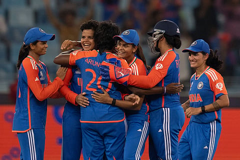 Indian players celebrates the wicket of Sri Lanka's Nilakshika Silva during the ICC Women's T20 World Cup 2024 match between India and Sri Lanka at Dubai International Stadium, United Arab Emirates,