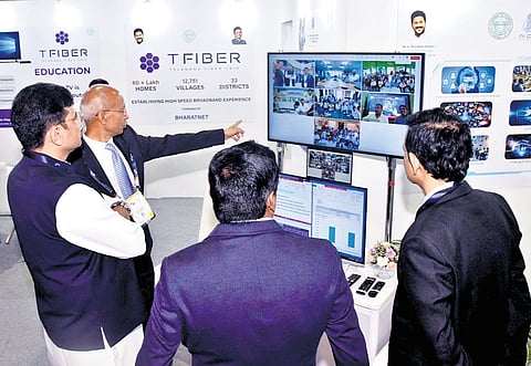 IT and Industries Minister D Sridhar Babu visits the T Fiber stall at the ongoing IMC 2024 in Delhi on Tuesday