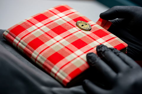 Anne Frank's diary, a red checkered notebook, the cornerstone of the Amsterdam museum's collection, is displayed in Amsterdam, Netherlands,