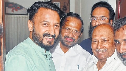 Congress veteran A K Antony greets Palakkad UDF candidate Rahul Mamkoottathil as the latter visited him at his house in Thiruvananthapuram on Wednesday