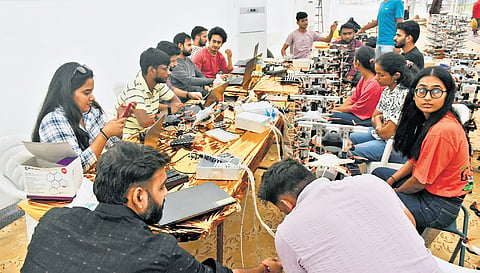 BotLab Dynamics techies in a huddle ahead of the drone show