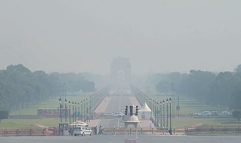 A thick blanket of smog covering Kartavya Pathon Monday