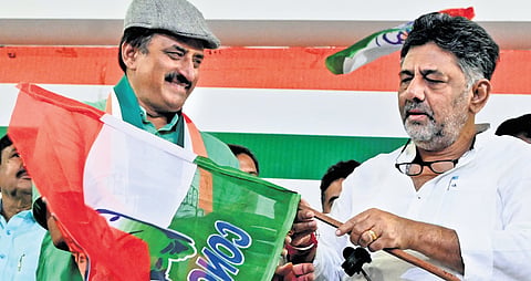 State Congress chief and Deputy Chief Minister DK Shivakumar welcomes former MLC CP Yogeshwara into the Congress, at KPCC office in Bengaluru on Wednesday