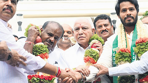 LoP in Assembly R Ashoka, Union Minister HD Kumaraswamy, former chief minister BS Yediyurappa, and NDA candidate from Channapatna, Nikhil Kumaraswamy, pose for shutterbugs, in Bengaluru on Thursday