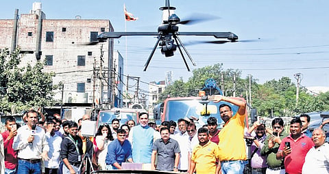 Environment Minister Gopal Rai and others during a drone demonstration