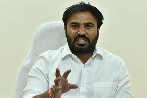 SAAP chairman Animini Ravi Naidu addressing the media during the press conference in Vijayawada.