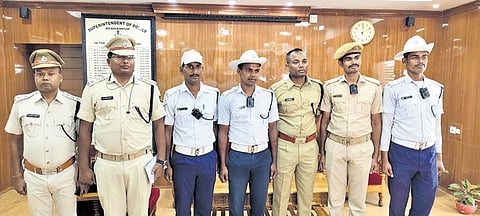 Traffic and other police personnel with body cameras on their uniforms