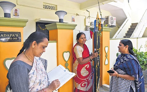 DWCRA members collect details from a household in Gajularamaram on the eve of the official launch of the caste census on Tuesday