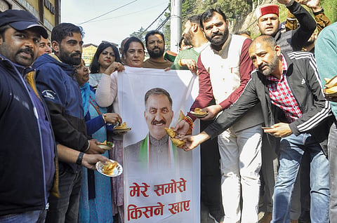 Members of the Bharatiya Janata Yuva Morcha (BJYM) during a march against the Himachal Pradesh government over the 'samosa' controversy, in Shimla, Saturday, Nov 9, 2024.