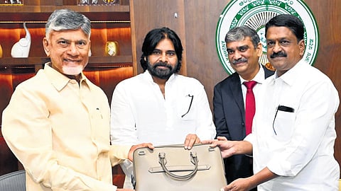 Finance minister Payyavula Kesav with Chief Minister N Chandrababu Naidu and Deputy Chief Minister Pawan Kalyan before introducing the Budget for FY2024-25 in the State Legislative Assembly on Monday