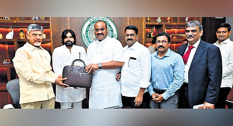 Agriculture Minister K Atchannaidu with Chief Minister N Chandrababu Naidu and Deputy CM Pawan Kalyan