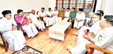 Sandeep Varier with IUML leaders at Panakkad in Malappuram on Sunday