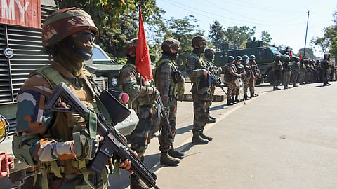 Security personnel deployed to maintain law and order amid a curfew imposed in view of recent violence in Manipur, in Imphal.