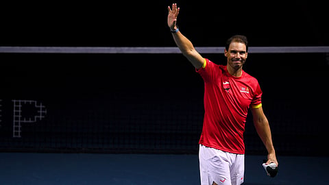 Spain's Rafael Nadal waves during a tribute to his career at the end of the quarter-final doubles match between Netherlands and Spain during the Davis Cup Finals at the Palacio de Deportes Jose Maria Martin Carpena arena in Malaga, southern Spain.