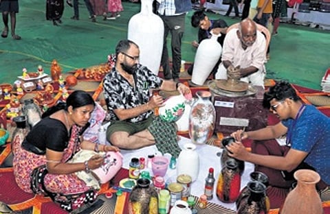 Artisans engaged in the pavilion