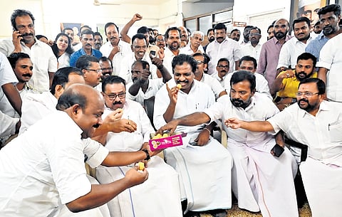 Congress workers, including senior leaders M M Hassan and Kodikkunnil Suresh, celebrate the party’s twin victory in the bypolls at Indira Bhavan in Thiruvananthapuram on Saturday
