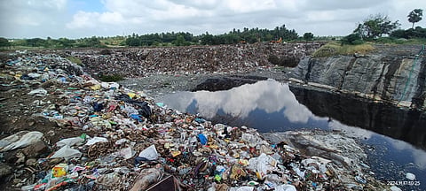 Garbage dumped in stone quarries at Pongupalayam village in Tiruppur district.