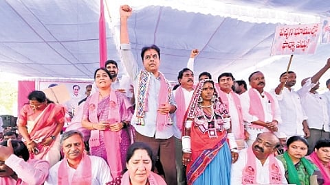 BRS working president KT Rama Rao raises his fist during a Maha Dharna organised in Mahabubabad on Monday