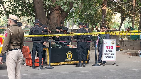 Bomb disposal squad at the blast site.